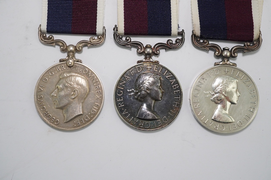 Three GVI and later Royal Air Force Long Service and Good Conduct Medals; GVI (renamed) to 362743 Act.F.Sgt.A.J.Vizer R.A.F; ERII to Sgt M R Bryant (R8225378) RAF; ERII to CPL P C W Outhwaite (E4272344) RAF. Condition -